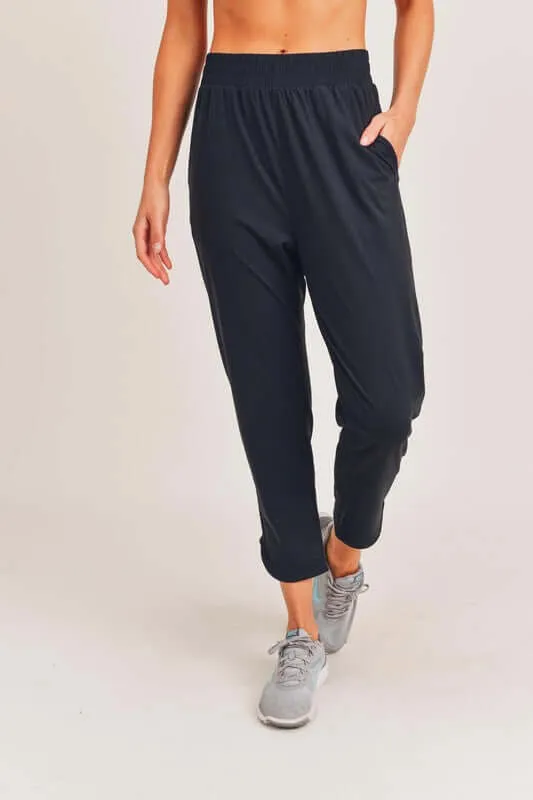 Black Athleisure Joggers with Curved Notch Hem