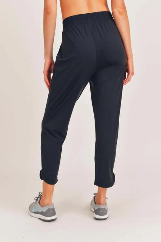 Black Athleisure Joggers with Curved Notch Hem