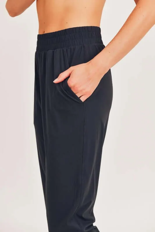 Black Athleisure Joggers with Curved Notch Hem