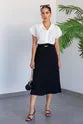 Gold clasp with arched skirt -